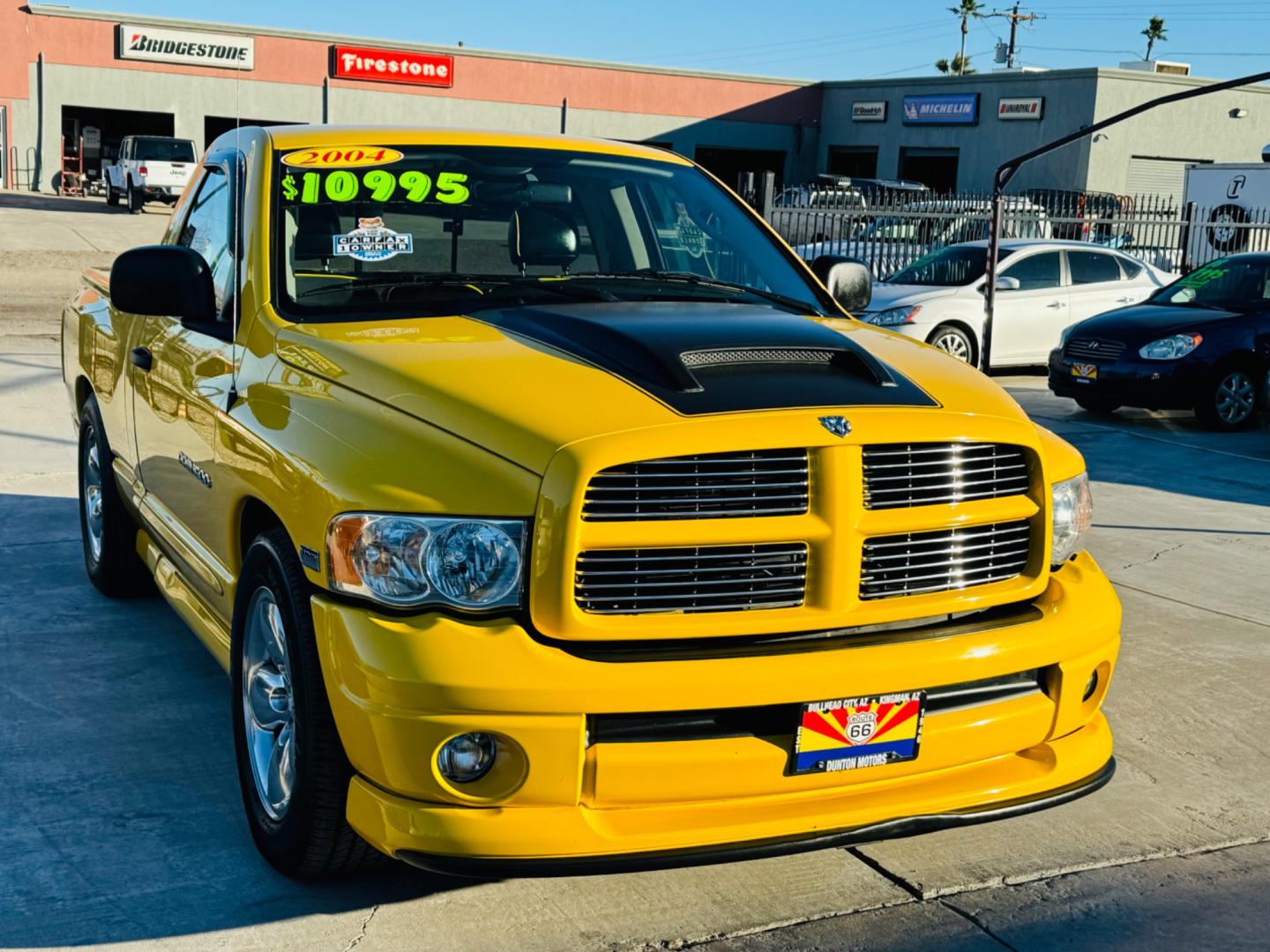 2004 Yellow /black Dodge Ram 1500 (1D7HA16D54J) , located at 2190 Hwy 95, Bullhead City, AZ, 86442, (928) 704-0060, 0.000000, 0.000000 - 2004 Dodge Ram SLT Bumblebee edition. Bright yellow with a black leather interior with yellow trim. This limited Bumblebee edition truck will sure turn heads. Hemi engine. 20 in wheels . *1 owner. matching tonneau cover. In excellent shape. 2004 Dodge Ram 1500 Rumble Bee. It is a limited edition tru - Photo#1